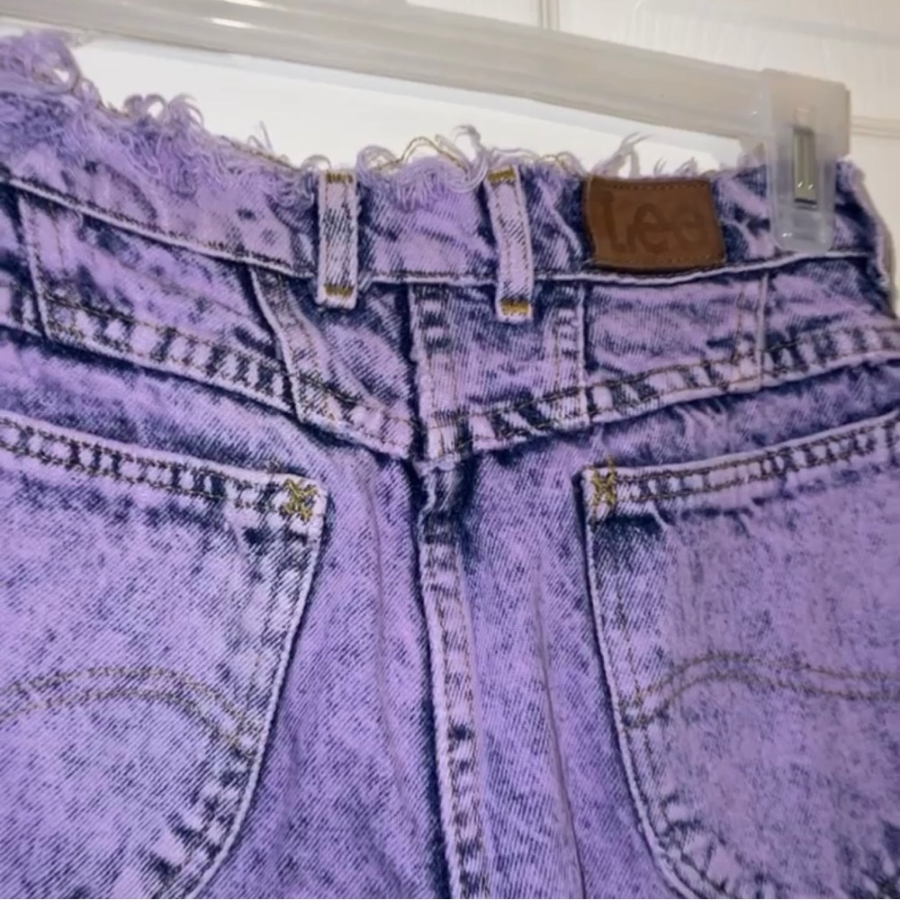 Purple dyed acid-wash jeans